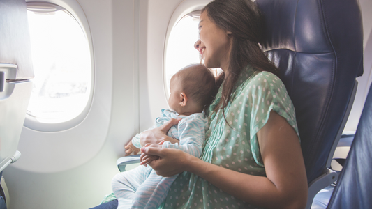 Mom and her baby on a plane