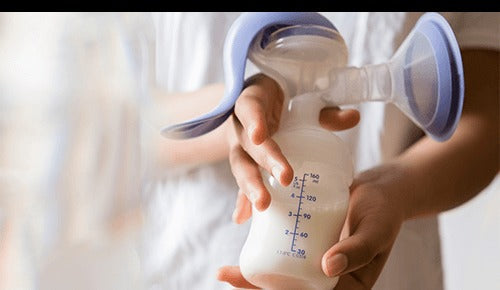 Breast milk pumping with manual pump, expressing fresh breast milk for baby feeding and storage