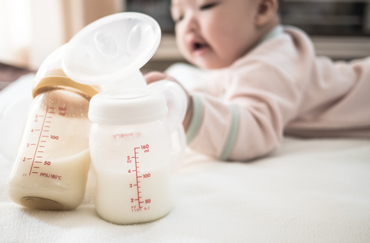 a baby and baby bottles