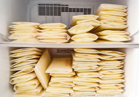 Breast milk neatly stored in a freezer