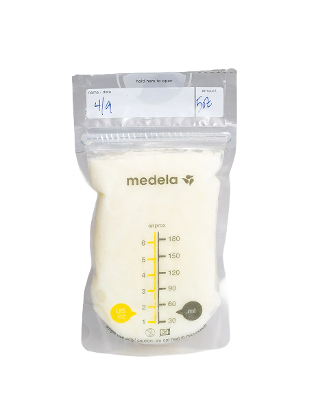 Medela breast milk storage bag filled with expressed breast milk, labeled and measured for safe freezing, storage, and preparation for freeze-drying or long-term preservation