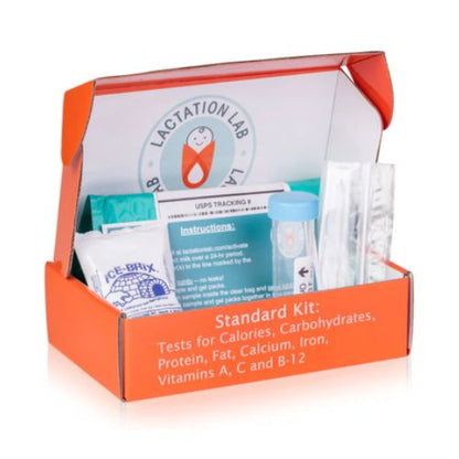 Orange Lactation Lab Standard Kit box open to display testing supplies, including instructions, test tube, ice pack, and materials for analyzing breast milk nutrition.